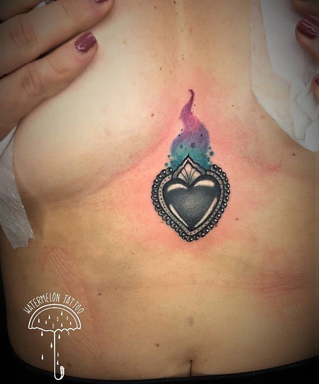 Fresh shot of a lovely wee sacred heart by Noemi at Watermelon Tattoo.
