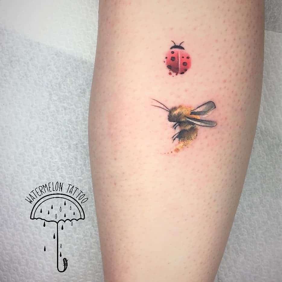 Handpoked two-spot ladybird tattoo for Jade.