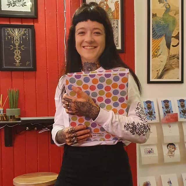 Say hi to Charlotte, our very own studio assistant. Here she is hugging her contract and induction folder which will chronicle her achievements and path towards becoming a tattoo artist. Watermelon Tattoo proudly support the national living wage.
For updates on her path give the girl a follow:
