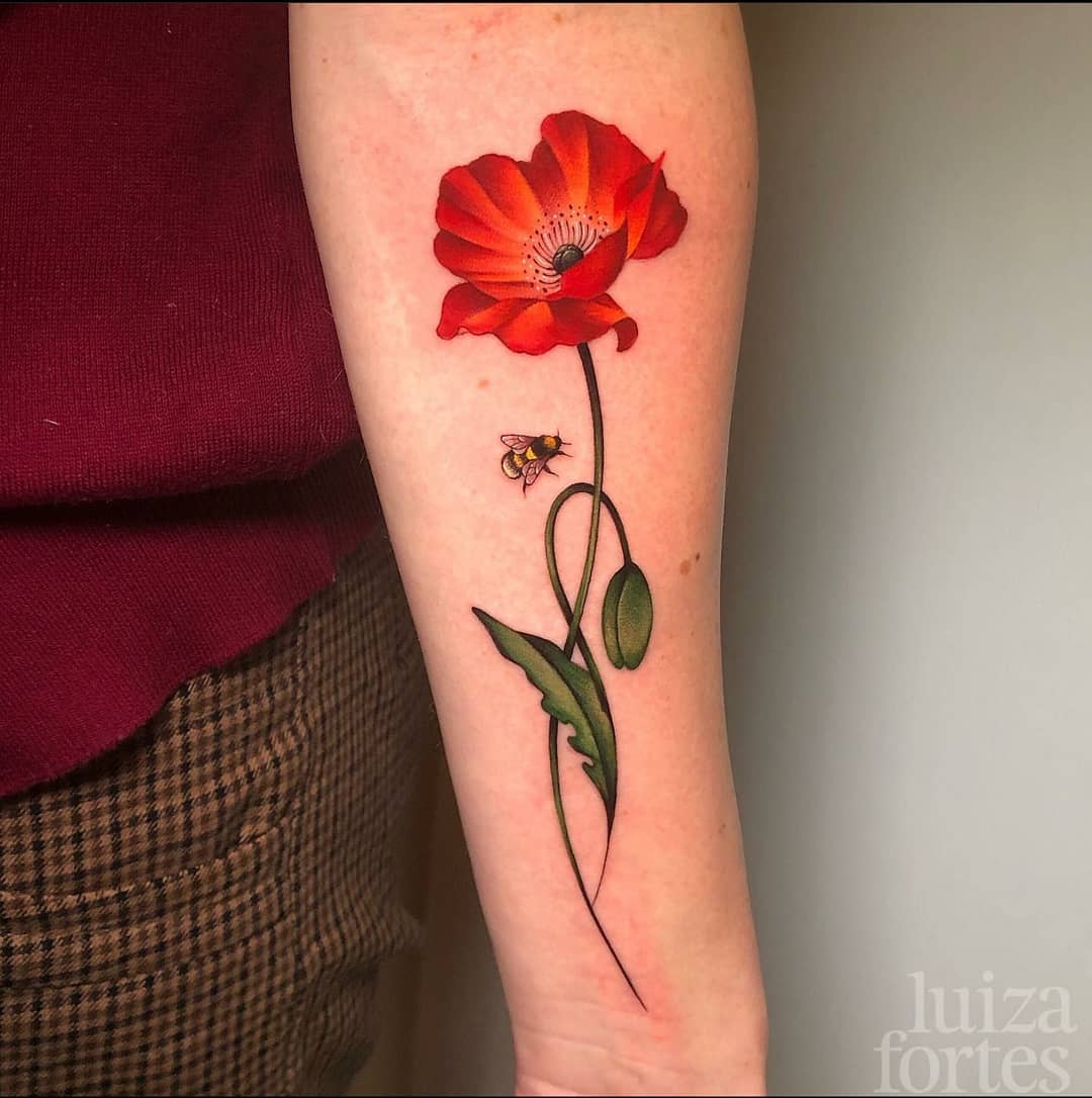 Delicate flower tattoo done in fine line
