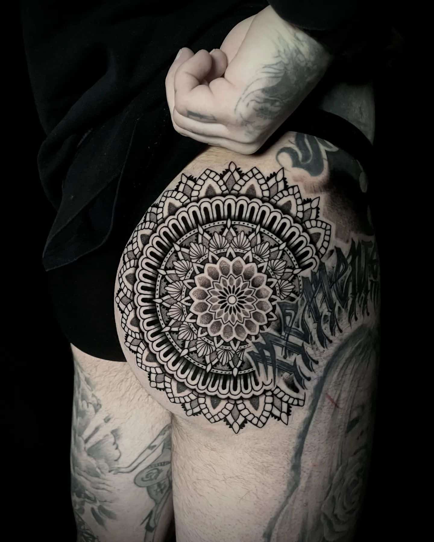 Black and grey mandala shoulder tattoo by Laura Jade TattooNOW