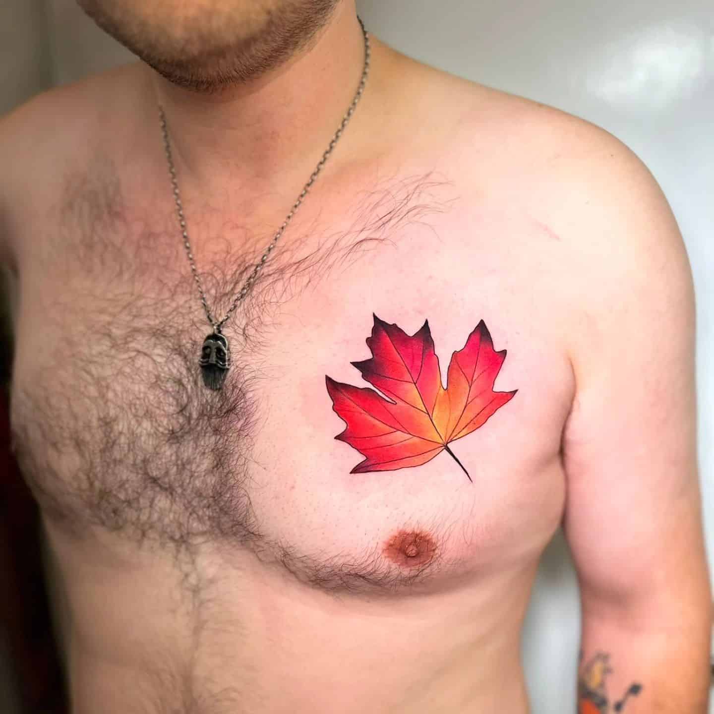 Leaf Tattoo On Man Chest